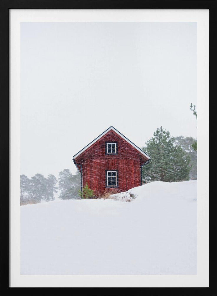 Old red house during snowstorm | Poster
