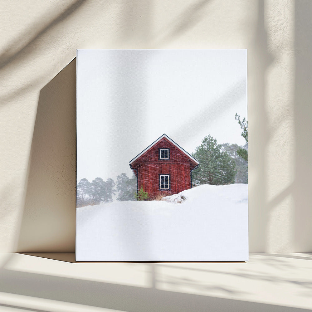 Old red house during snowstorm | Canvas